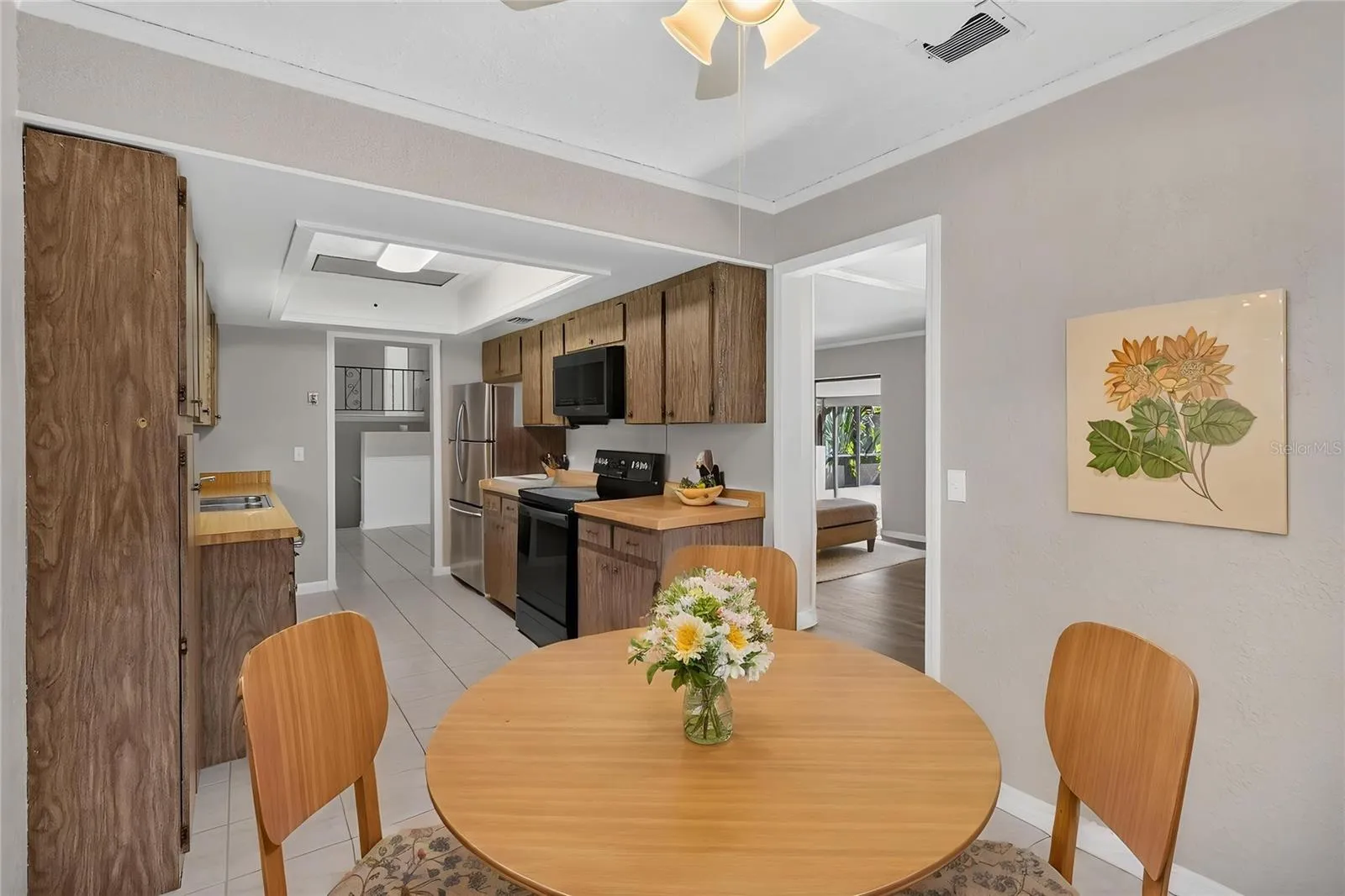 Kitchen from angle of eat-in dinette area.  Doorway shown to Dining Room (virtual furnishings)