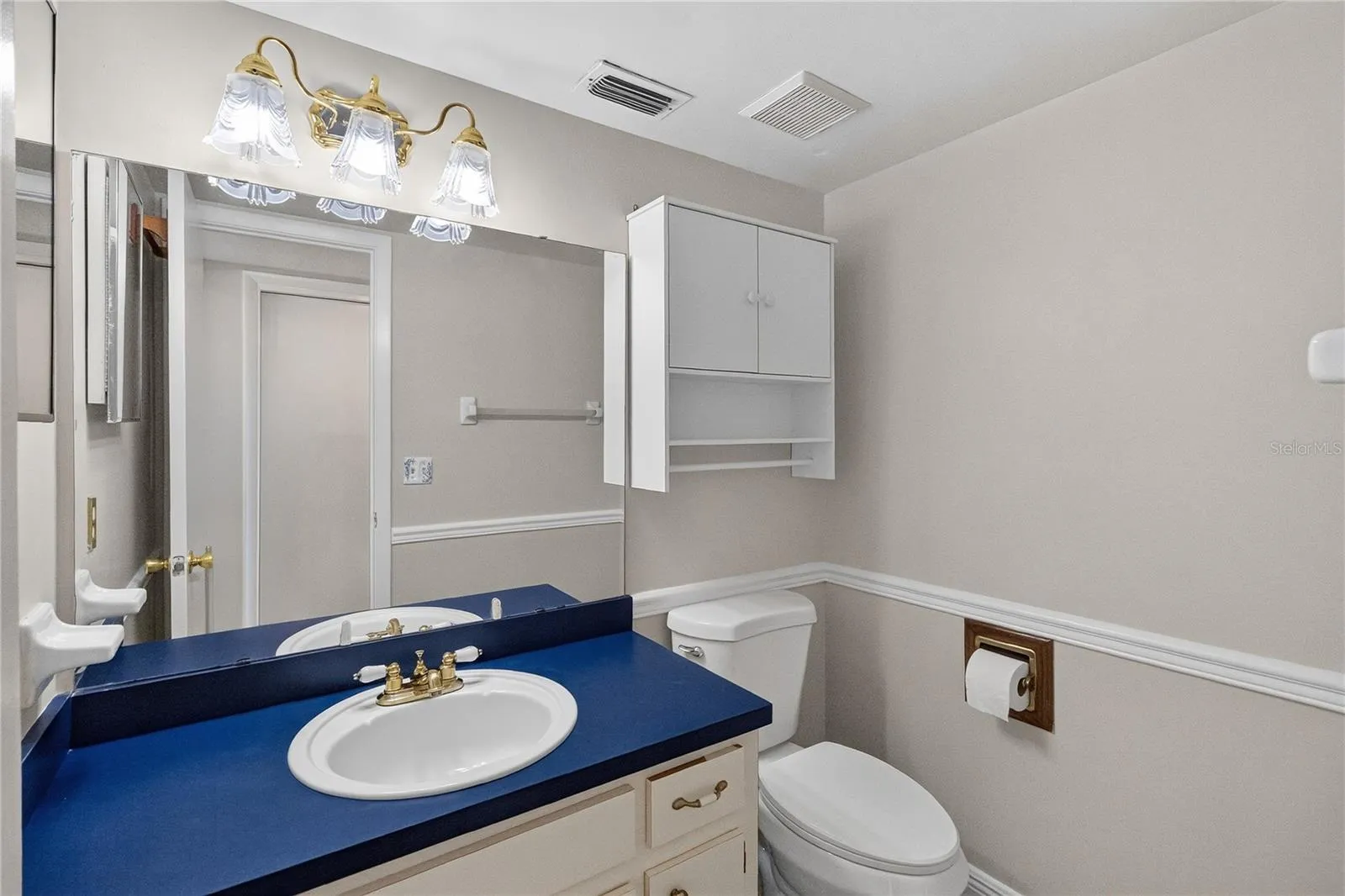 1/2 Bath Ground Floor - a few steps from entry from the garage.