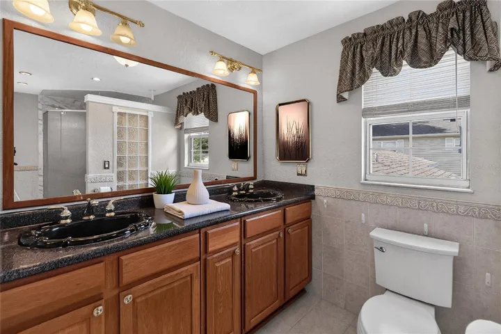 Primary en suite bathroom - spacious with shower and changing area