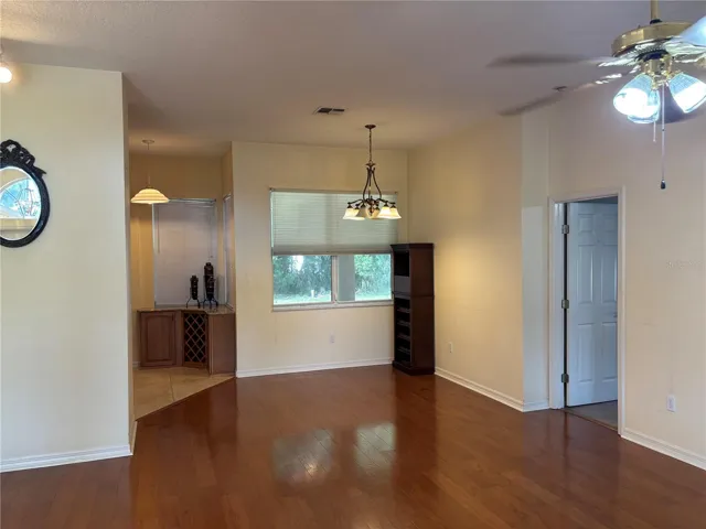 Great room with door to primary bedroom