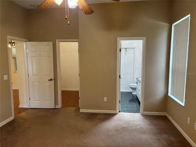 Primary bedroom with walk in closet