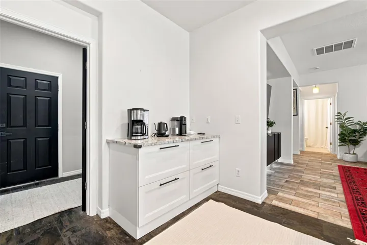 Garage entrance and Laundry Room
