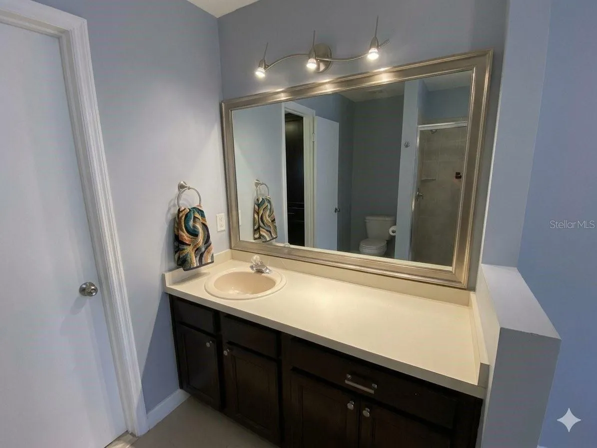 1st floor Primary Bedroom Make up or 2nd sink vanity Virtually Enhanced