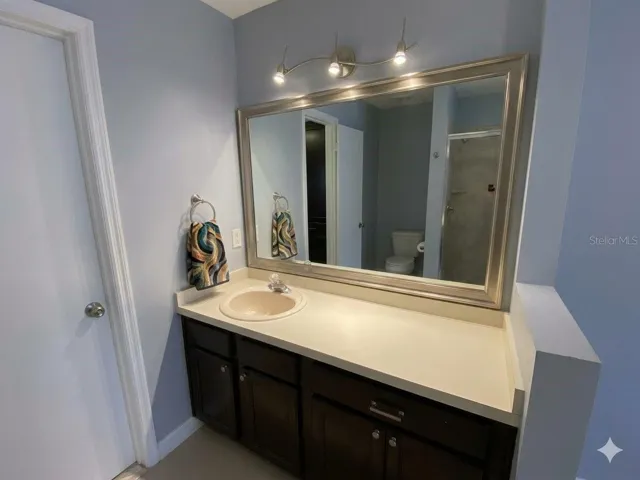 1st floor Primary Bedroom Make up or 2nd sink vanity Virtually Enhanced
