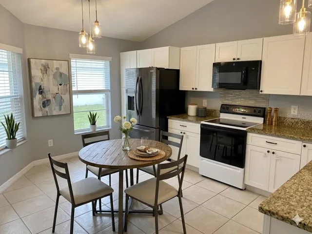 Kitchen with Eat in Dining. Virtually Staged