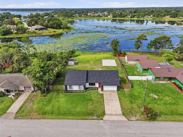 Front of the house w/view to the lake and backyard