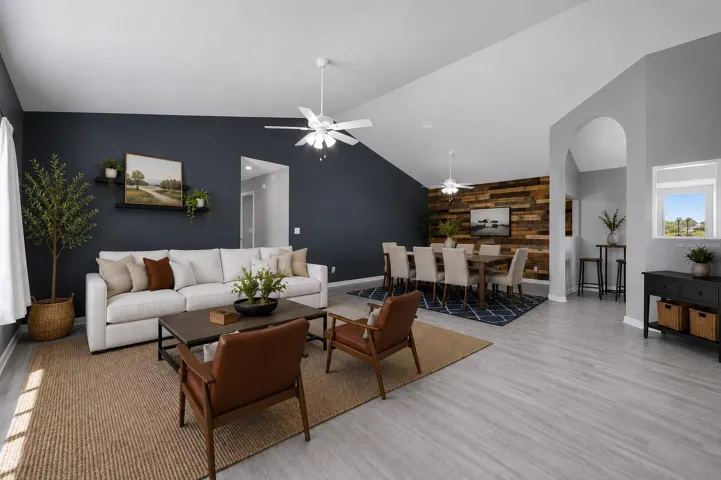 Great Room. This image has been virtually staged for illustrative purposes to demonstrate the potential design and layout of the space. Furniture, décor, and accessories shown are virtual and are not included with the property.