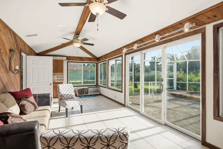 Huge Florida room overlooking the pool