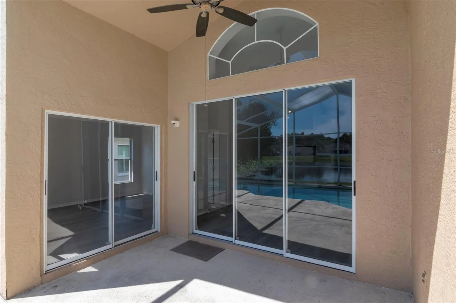 Pool Deck Access From Florida/Great Room & Main Bedroom Sliders.