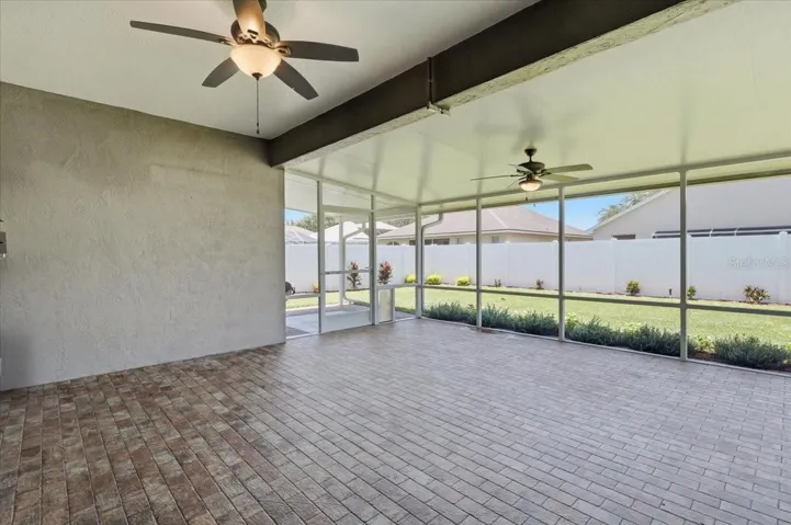 Scr patio w/ pretty brick looking tile floor