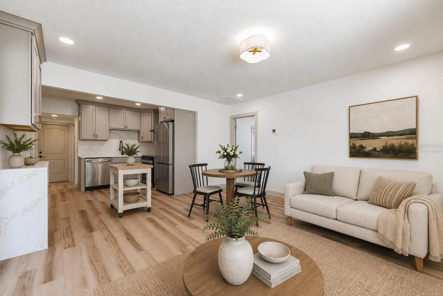 Virtually Staged.  Great Room and Kitchen