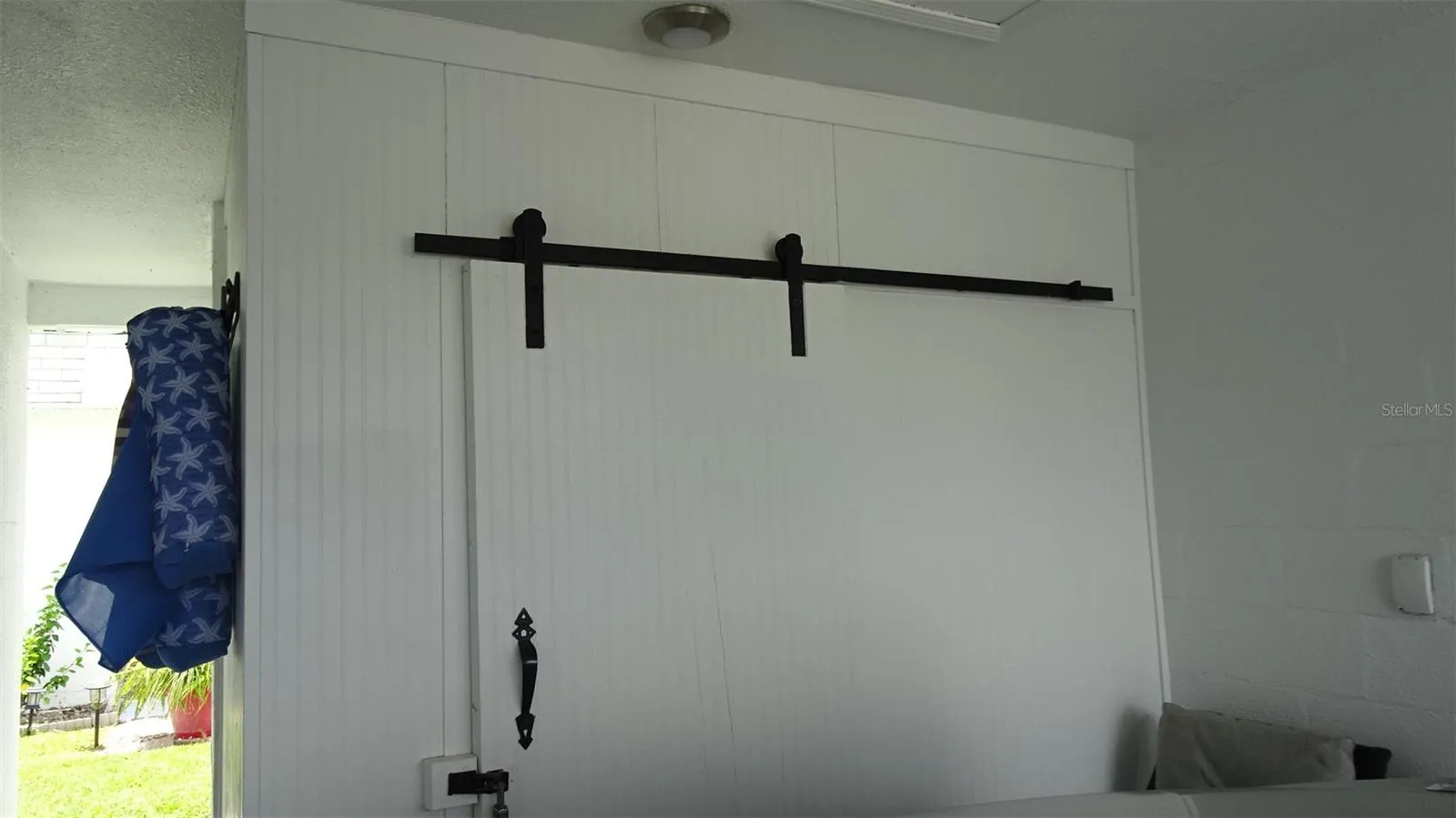 8 ft x 5 ft storage room. Laundry room in behind this room.