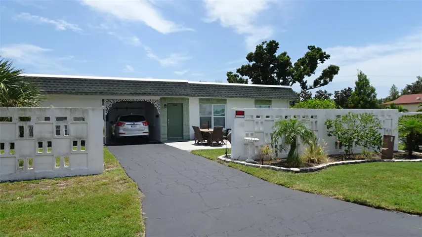 Corner Villa, extra long driveway and large front yard.