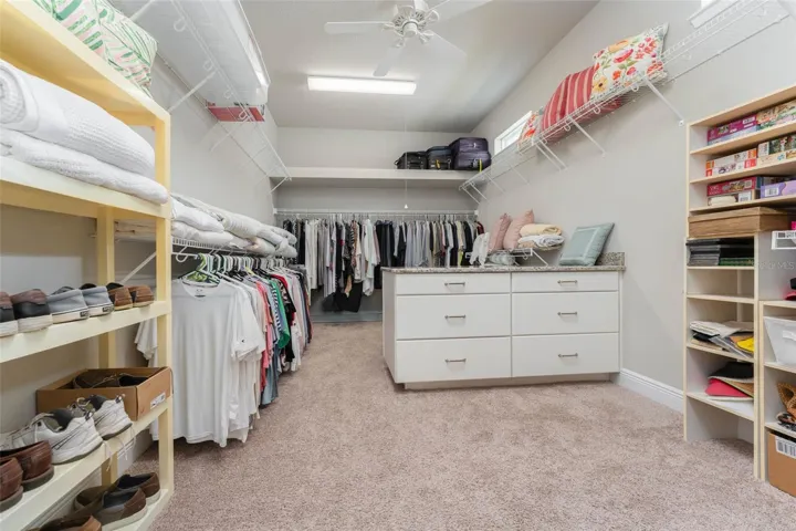 Dreamy Walk in Closet in Primary with Windows, Built in Dresser &amp; Shelving