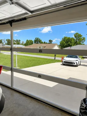 Garage screen - motorized