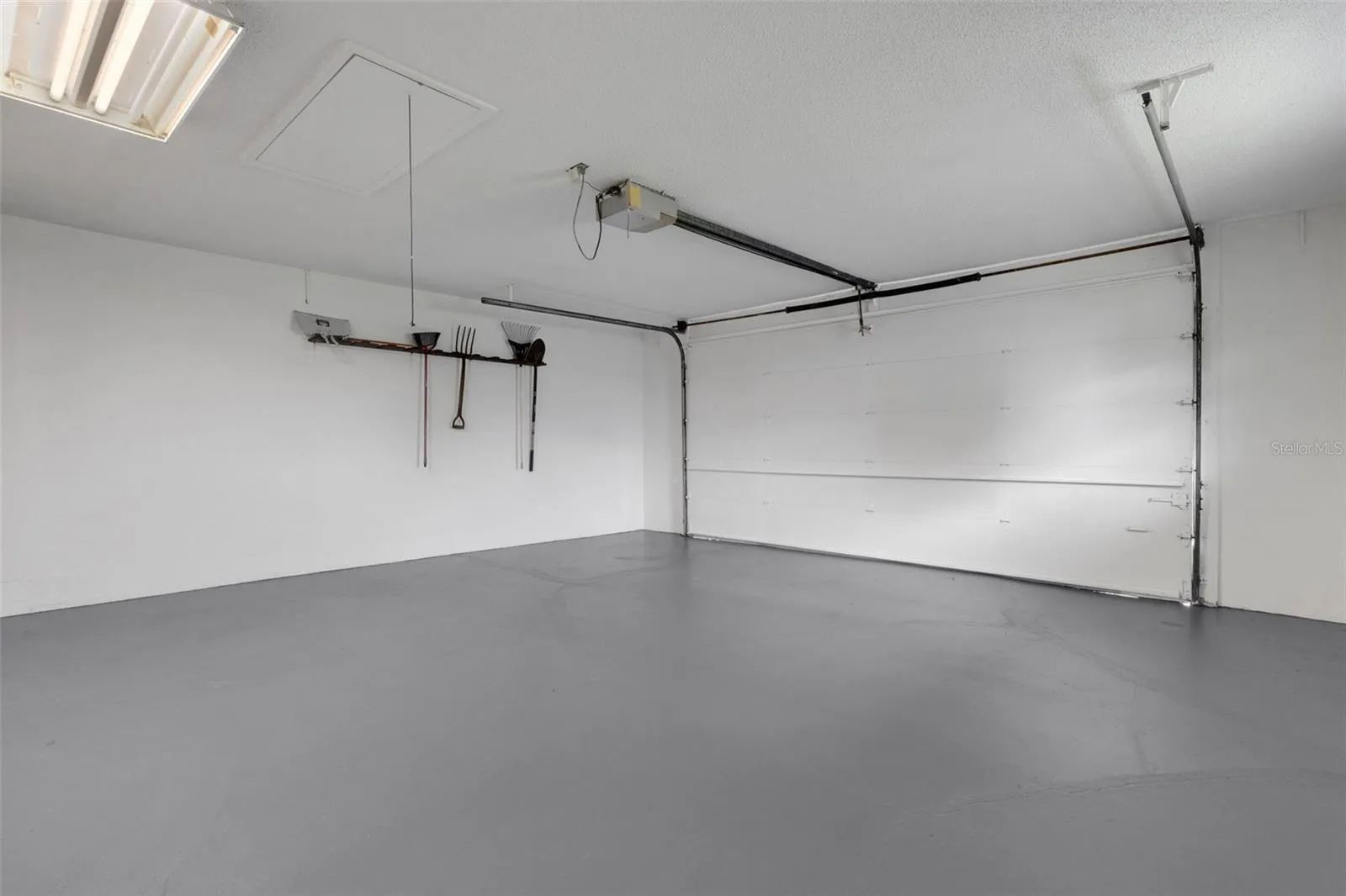 Oversized 2 car garage plenty of room for your tools and a work bench
