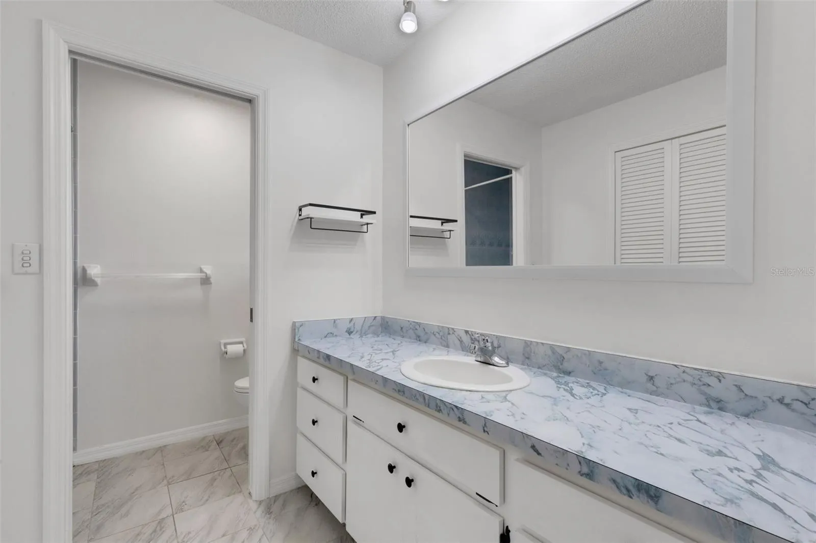 Large vanity with enough space to become a double
