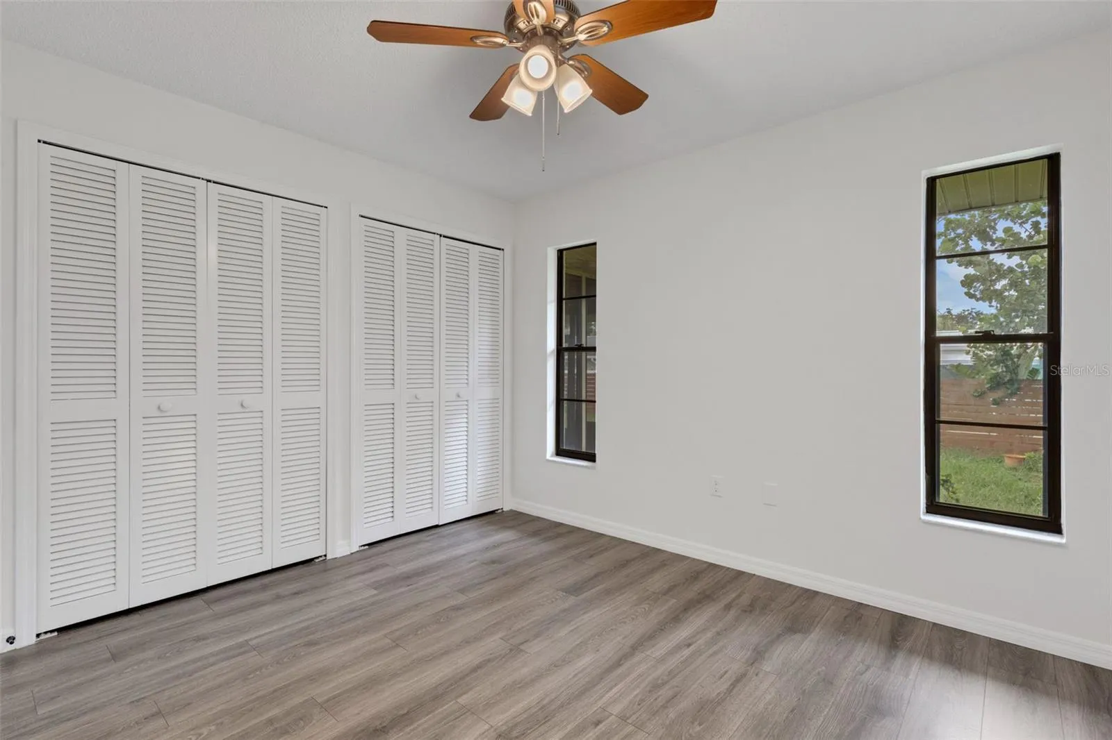 Guest bedroom 1 with plenty of closet space