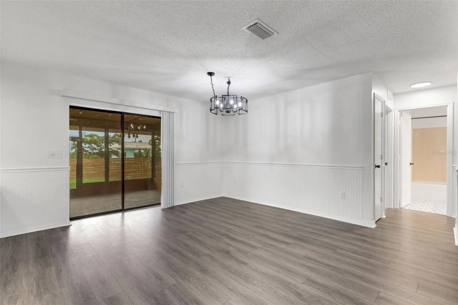 open floor layout to dining room