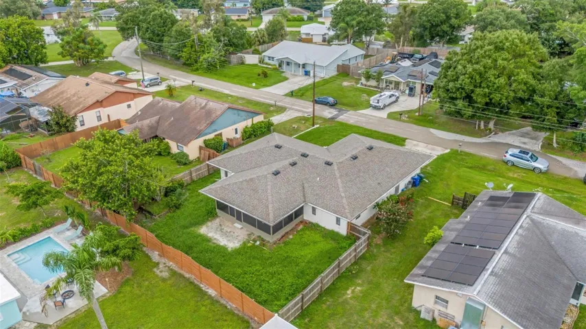 Large full fenced in yard plenty room for a pool or porch.