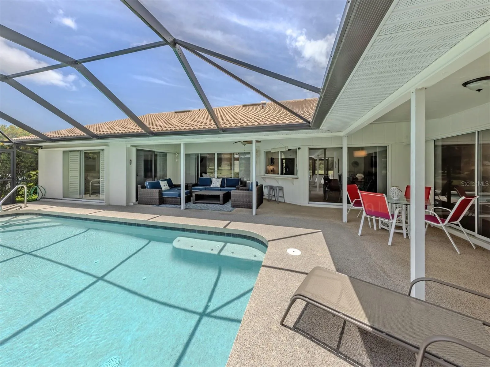 This spacious home opens from the primary, formal living, kitchen and hallway to the additional bedrooms allowing you to extend your living space outdoors