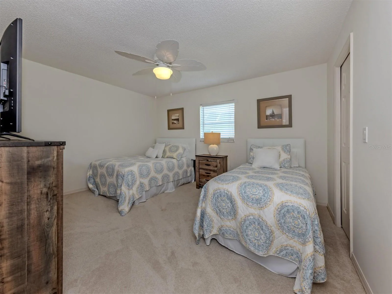 The second bedroom is located on the other side of the home and includes a walk in closet