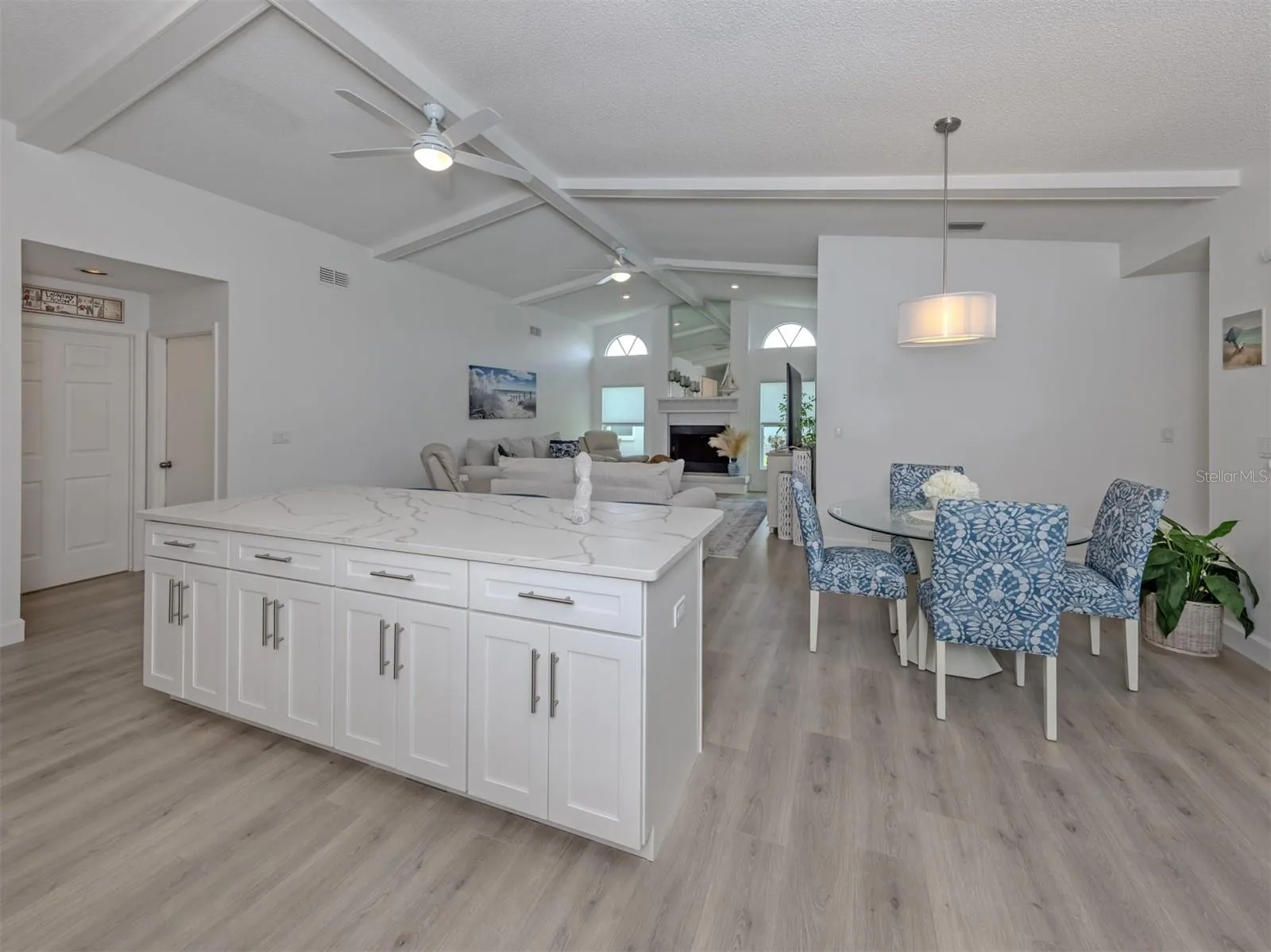 Perfectly redesigned kitchen overlooks the dinette and family room