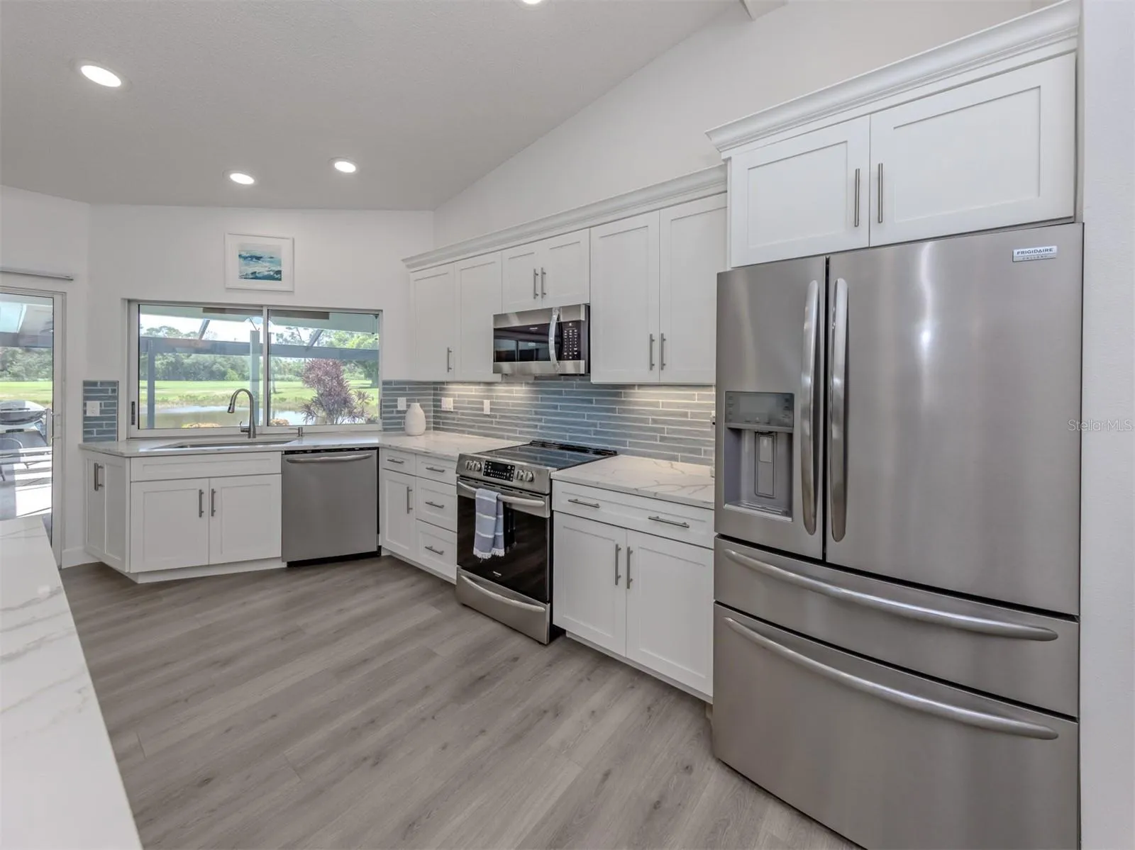The beautifully updated kitchen is a chef's dream!