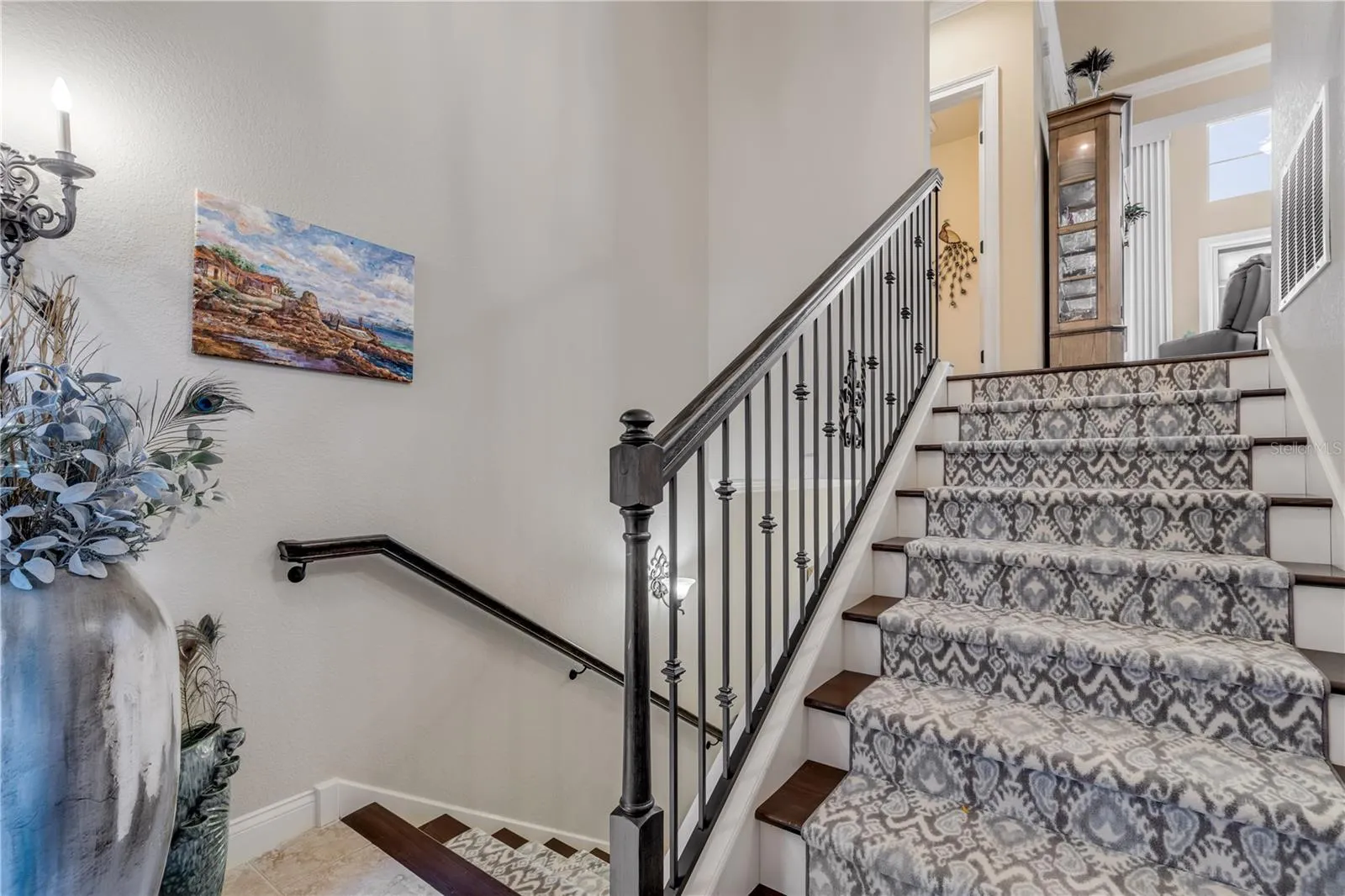 Go up for common area (Kitchen/dining/living)Go down for 2 guest bedrooms, guest bathroom, laundry room, and office