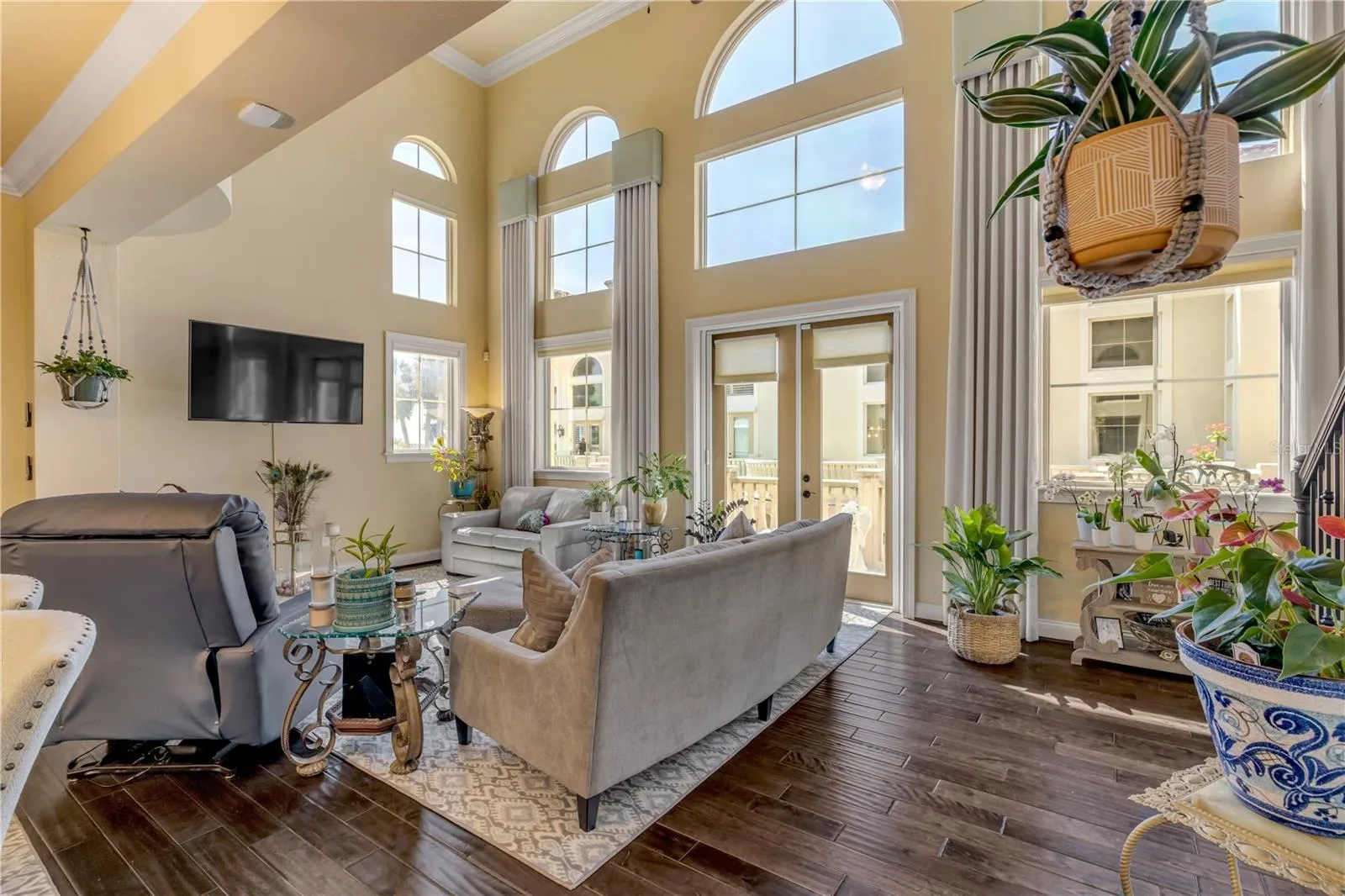 20 foot ceilings in living room with natural light