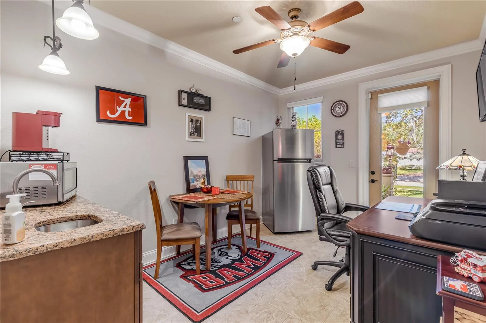 Office with exterior door to ground level