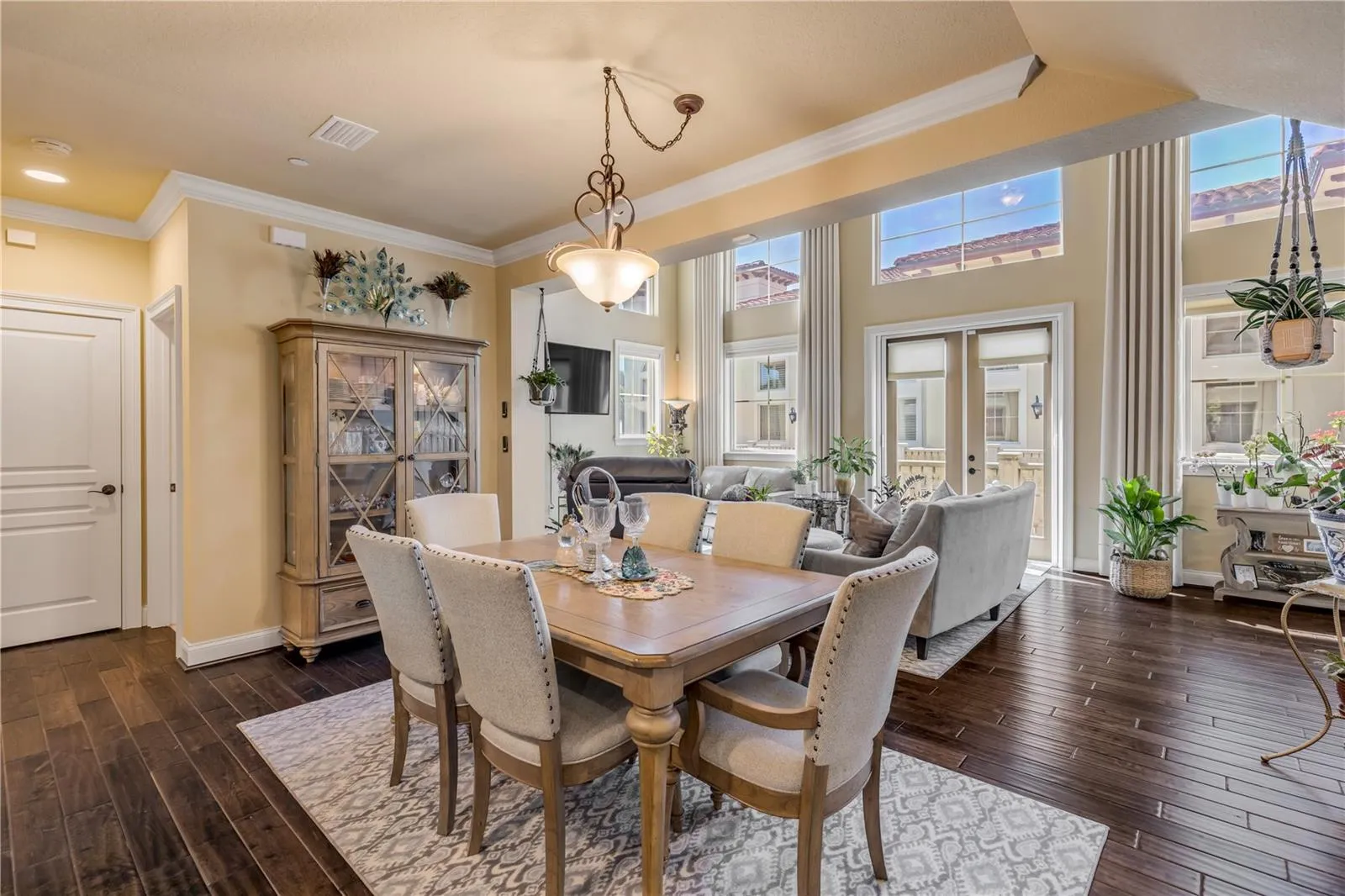 Hardwood floors, natural light, and crown molding.