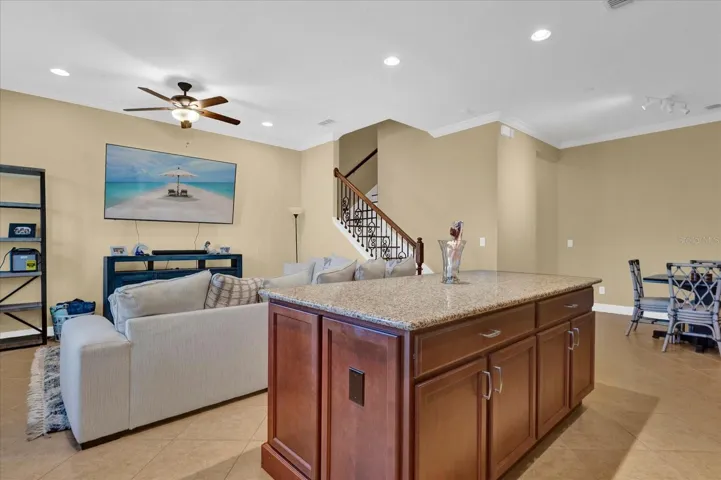 Open-concept living and kitchen area with a large center island — perfect for entertaining.