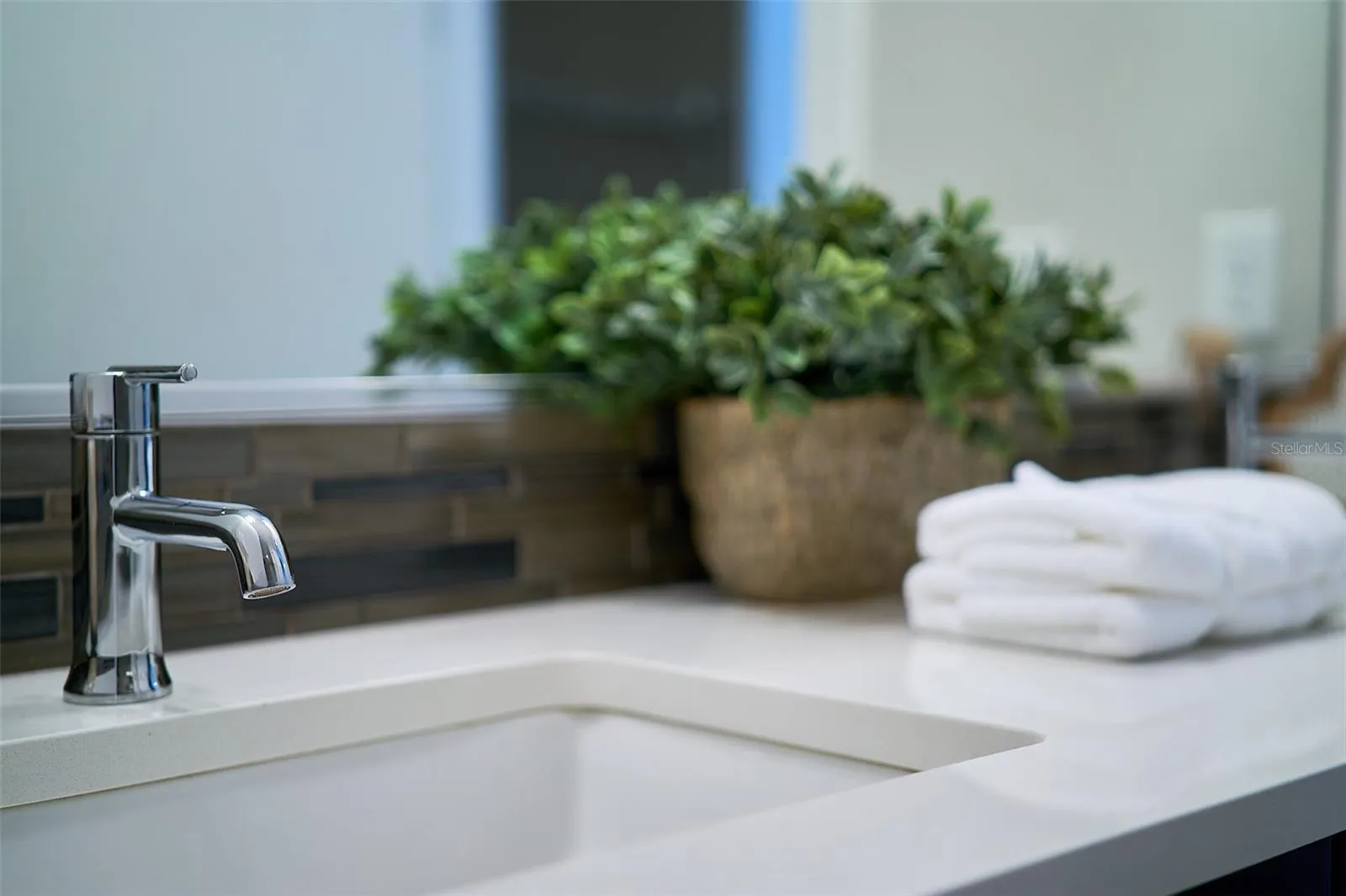 primary bathroom sink with quartz counters