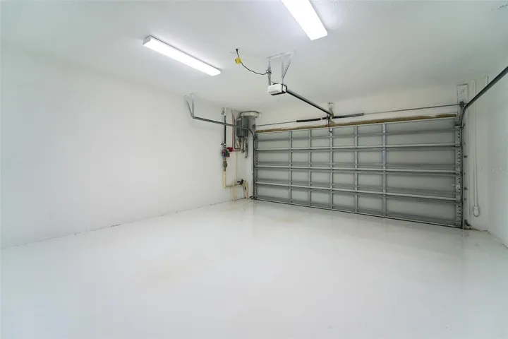 spotless painted garage with epoxy floors