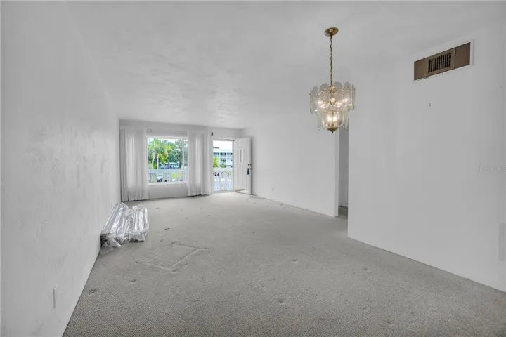 Dining area / living room - additional vertical blinds stay with unit.