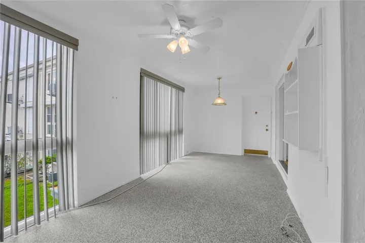 Sunroom with rear access to breezeway