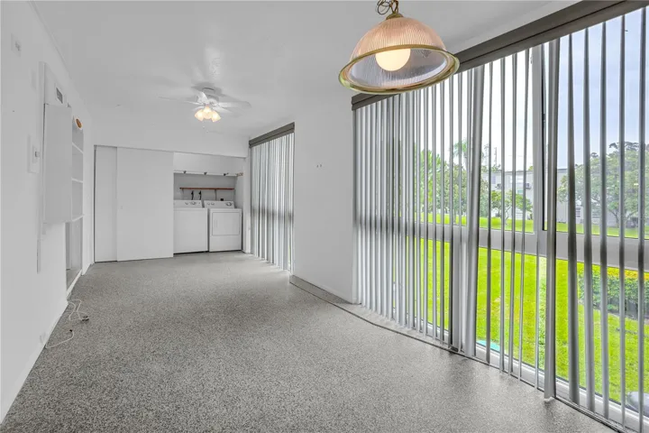 Sunroom (NOTE: washer dryer NOT included in sale of condo)