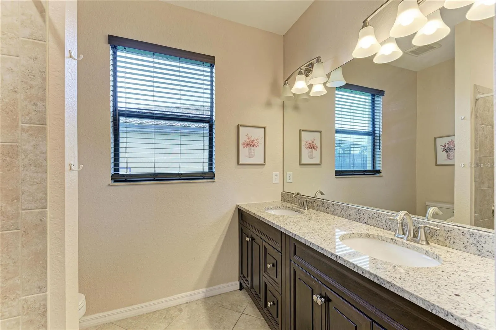Guest bathroom with dual sinks