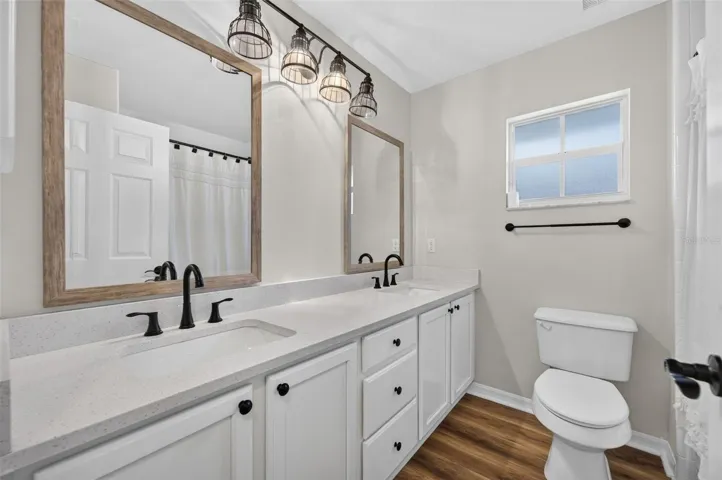 Guest bathroom located conveniently between bedroom 2 and 3.