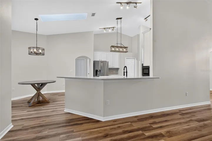 Fantastic bar area for guest seating just off the kitchen.