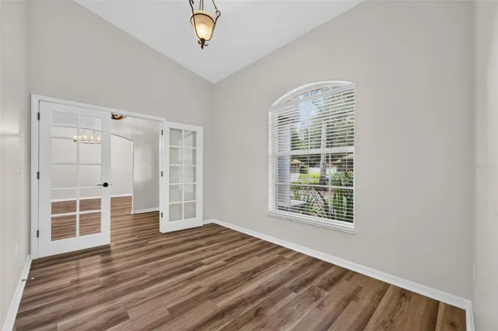Office with French doors allow for privacy when needed.