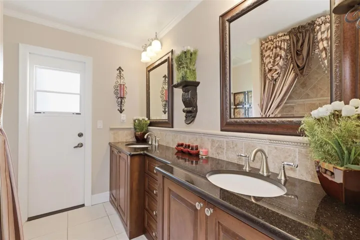guest bathroom also with custom cabinetry