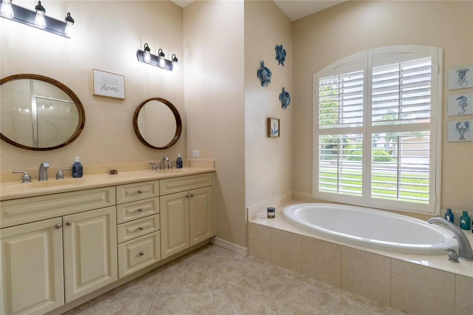 Luxurious Primary Bathroom with Soaking Tub &amp; Dual Vanities