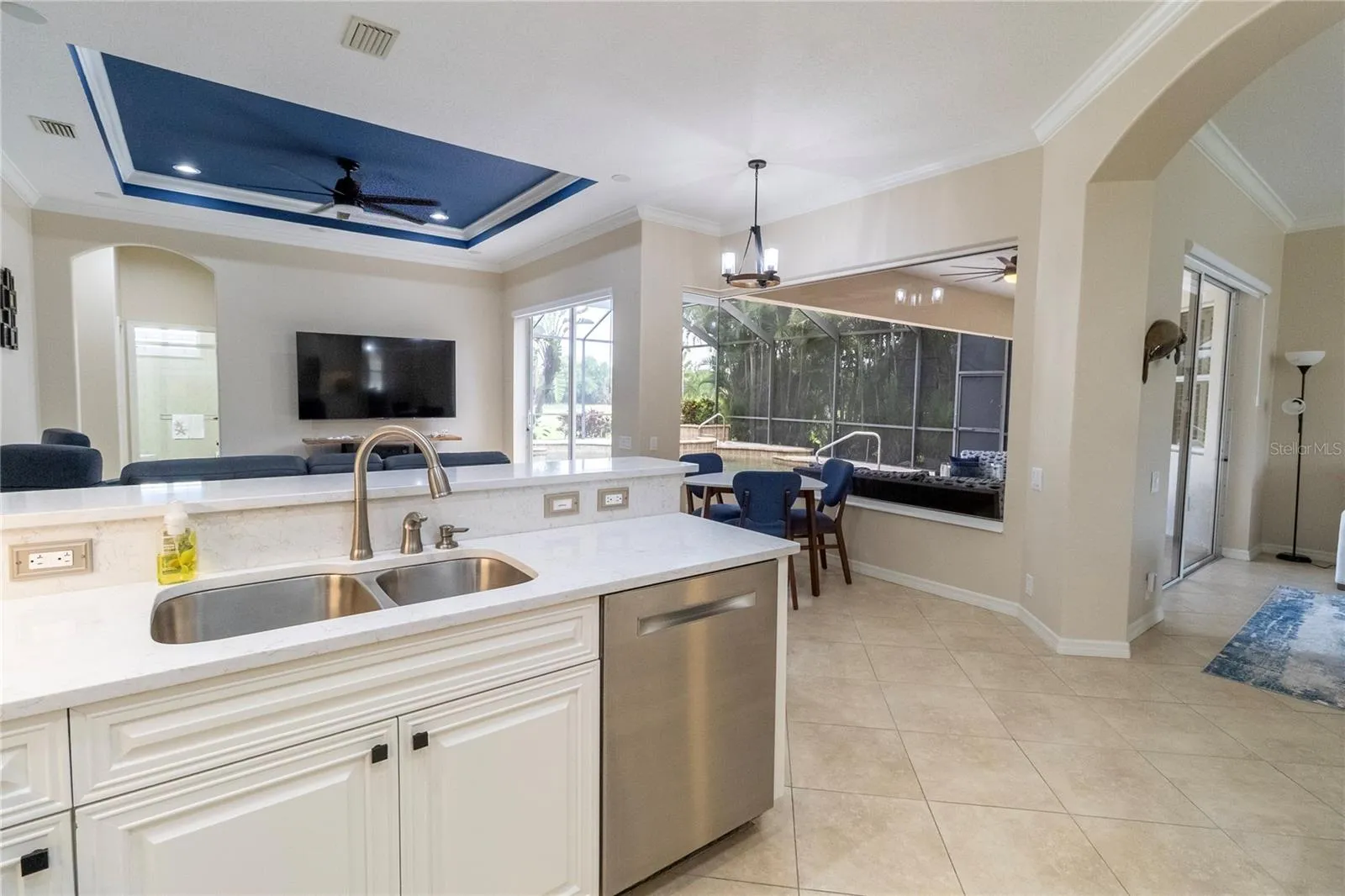 Dream Kitchen with Views of the Tropical Pool Oasis