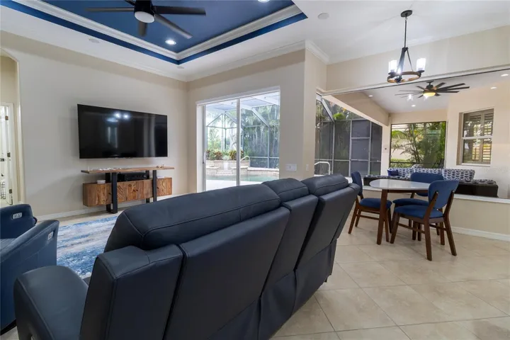 Light-Filled Great Room with Sliding Glass Doors &amp; Bay Window Overlooking the Resort-Style Pool