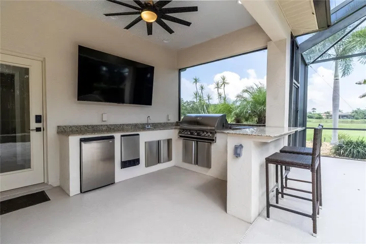 Outdoor Entertaining Space with Kitchen, Bar &amp; TV