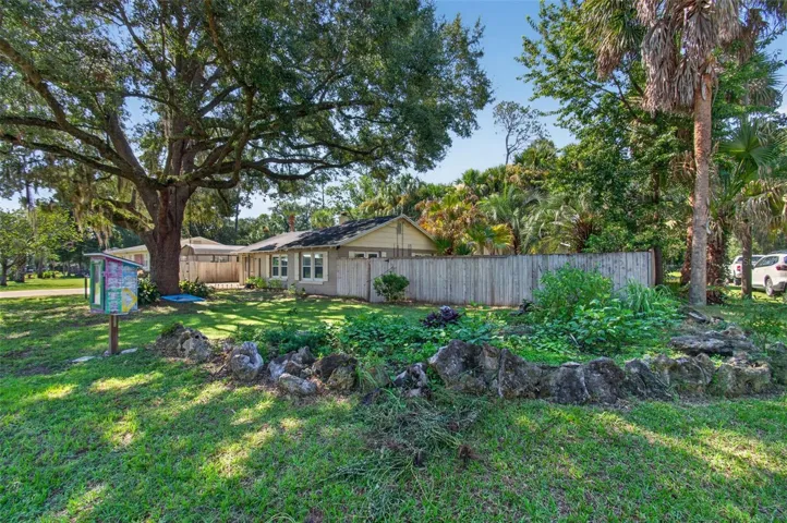 View of home from street corner of lot