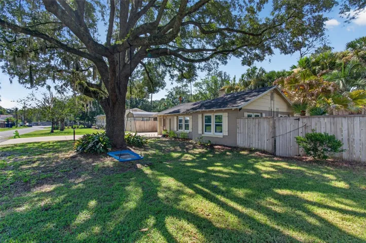 Front view with shade tree