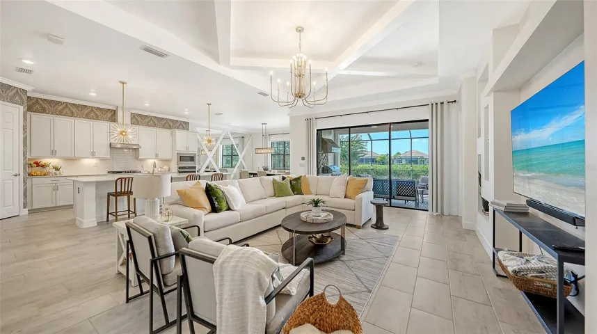 Great room floor plan with coffered ceiling and wall accents